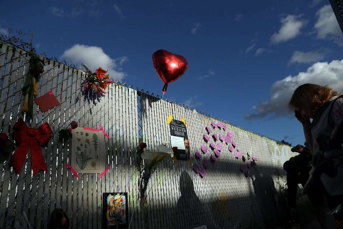 A heart balloon at a memorial on E. 12th Street in the aftermath of the deadly Ghost Ship warehouse fire in Oakland, Calif., on Tuesday, December 6, 2016.