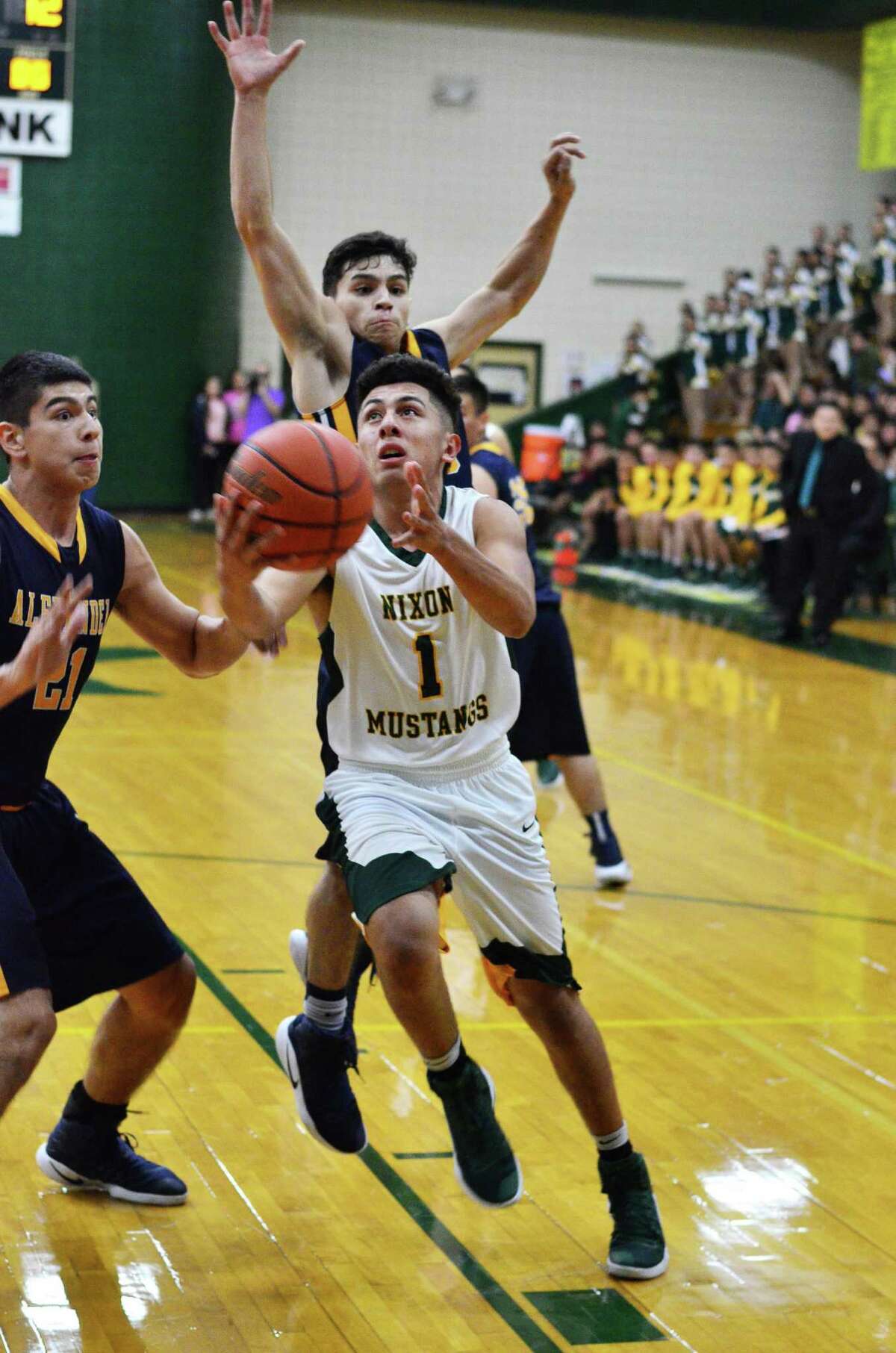 Nixon’s Esteban Guerra and the rest of the Mustangs extended their district win streak to 31 games with an 82-51 win over Veterans Memorial on Tuesday night in Mission.