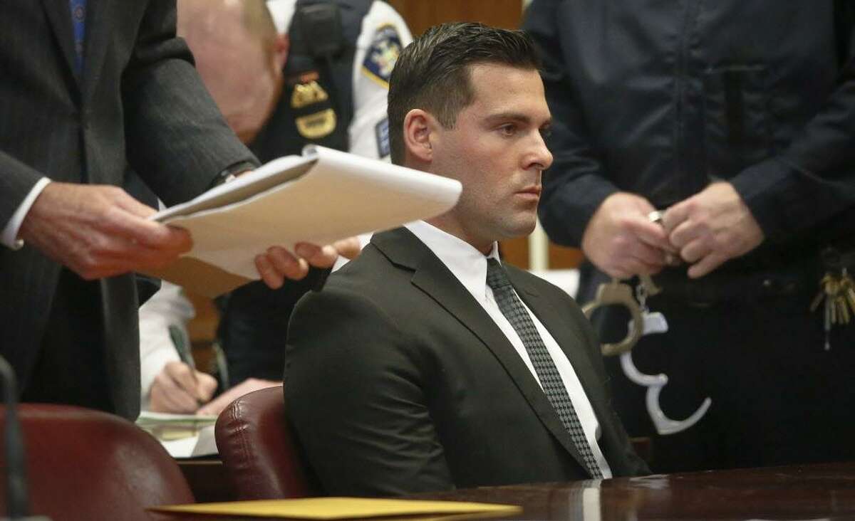 FILE — Lawrence Dilione, 28, of New Jersey, listens as his lawyer speaks during his hearing in criminal court, Tuesday Dec. 13, 2016, in New York. Dilione is charged along with James Rackover, who was charged with concealment of a human body, hindering prosecution and tampering with evidence in the stabbing death of 26-year-old Joseph Comunale from Connecticut. (AP Photo/Bebeto Matthews)