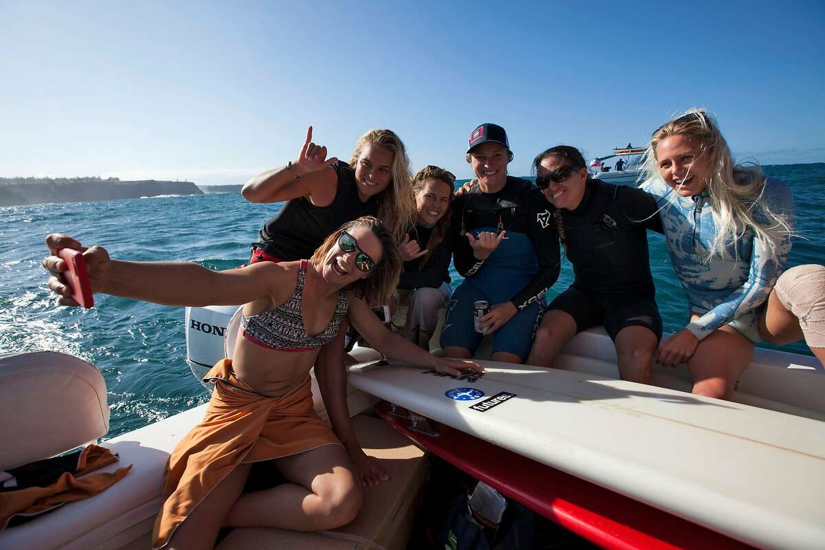 Bianca Valenti takes a group selfie with fellow surfers (from left) Felicity Palmateer, Tammy Lee Smith, Paige Alms, Andrea Mollera and Laura Enever during the inaugural World Surf League Pe'ahi Women's Challenge in Maui, Hawaii on November 11, 2016. San Francisco Bay area local surfer Bianca Valenti placed 5th overall and Paige Alms won the event. Photo by Sachi Cunningham