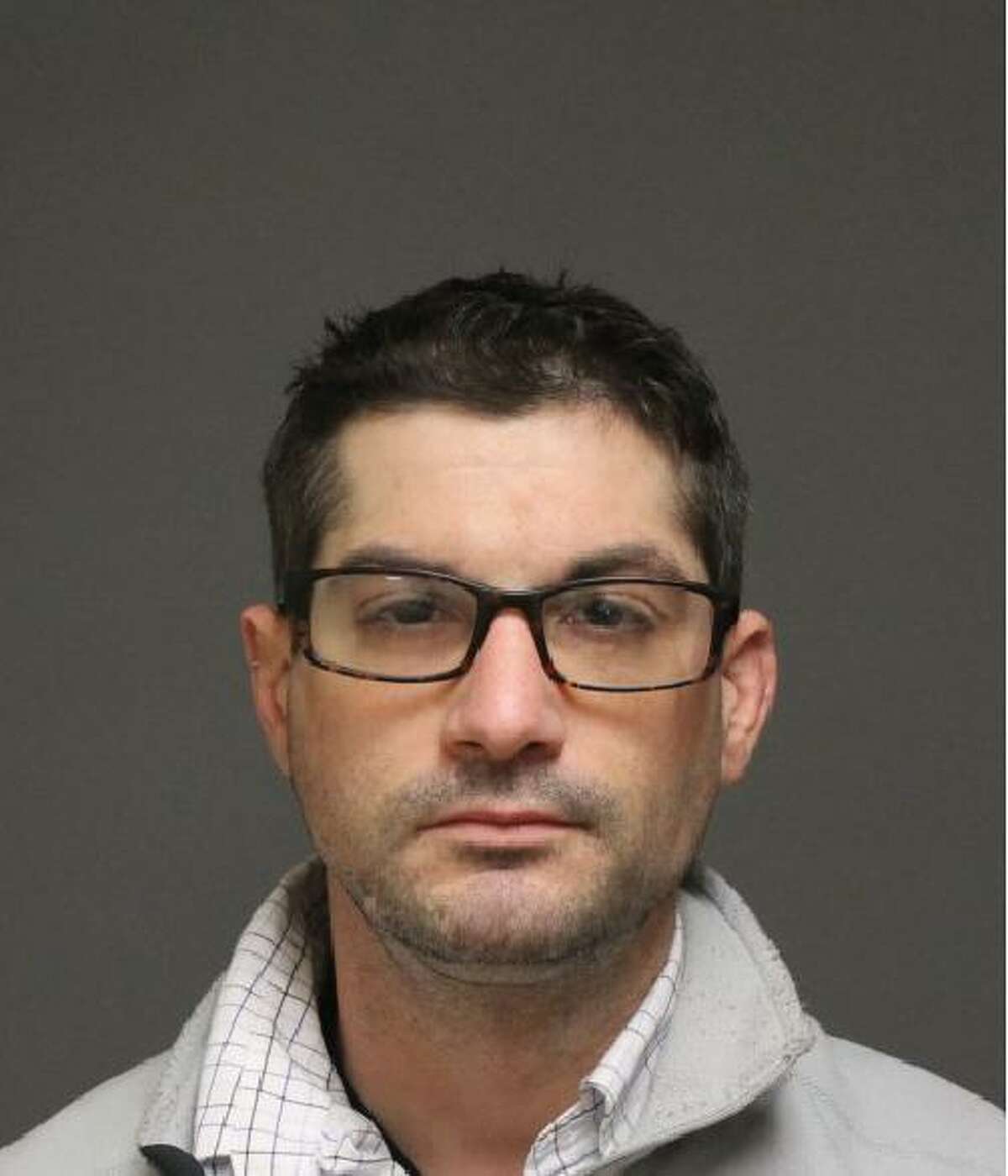 Christopher Bartmess, 35, of Fairfield, was charged with operating under the influence, narcotics possession and use and possession of drug paraphernalia in Fairfield, Conn. on Dec. 14, 2016.