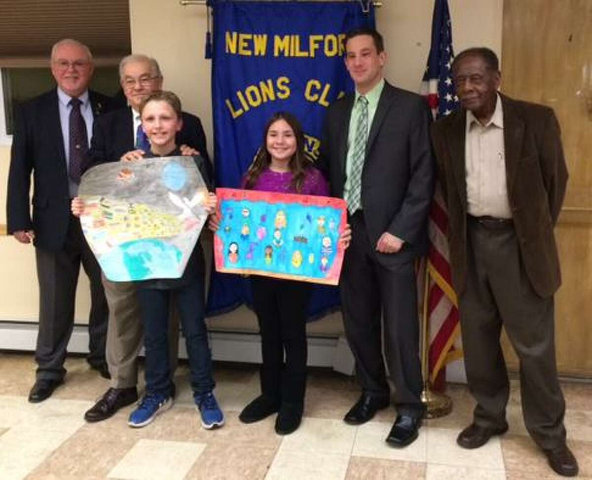 Two Schaghticoke Middle School students have taken the first step to becoming internationally recognized artists by participating in a local competition sponsored by the New Milford Lions Club. Their entries were among those submitted in the annual Lions International Peace Poster Contest. Sixth graders Kara Murphy and Parker Swinford, front, are shown above with their posters and, from left to right, Lions President James Bannan, SMS Transitional Administrator Len Tomasello, SMS Principal Dr. Chris Longo and Lion Herman Izzard.