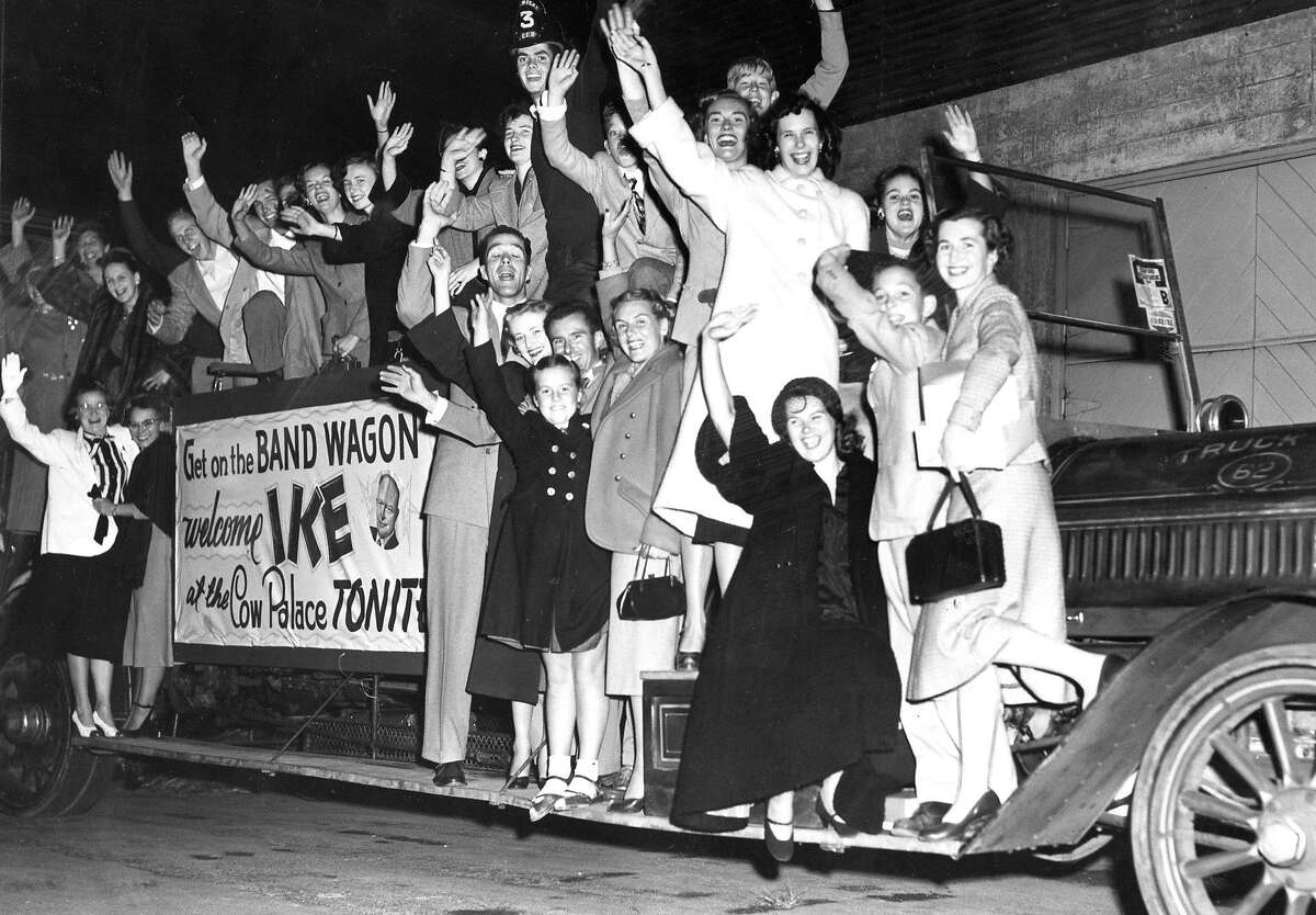 Dwight Eisenhower supporters join a bandwagon to the Cow Palace. Oct. 8, 1952.