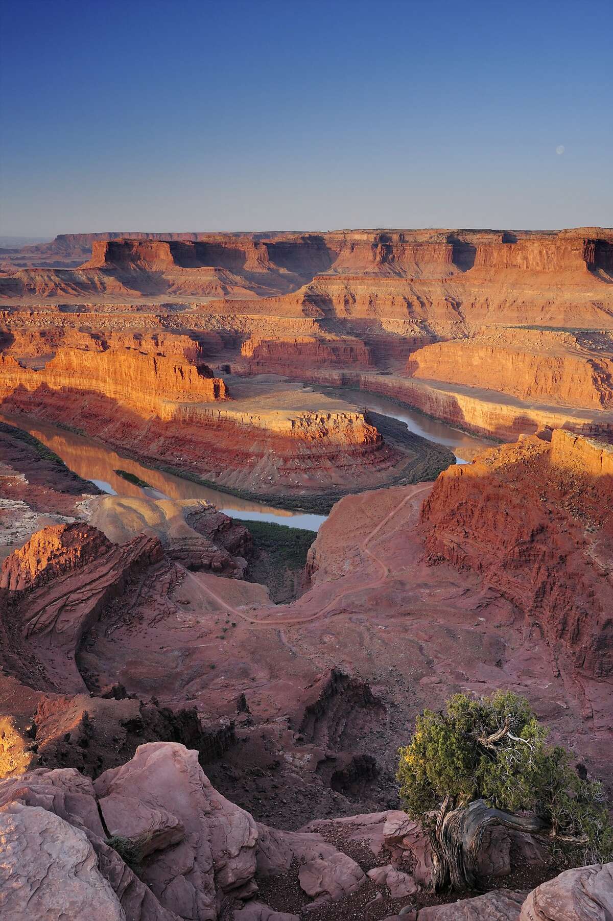 Sunrise at Dead Horse Point in Canyonlands National Park with view to Colorado River.