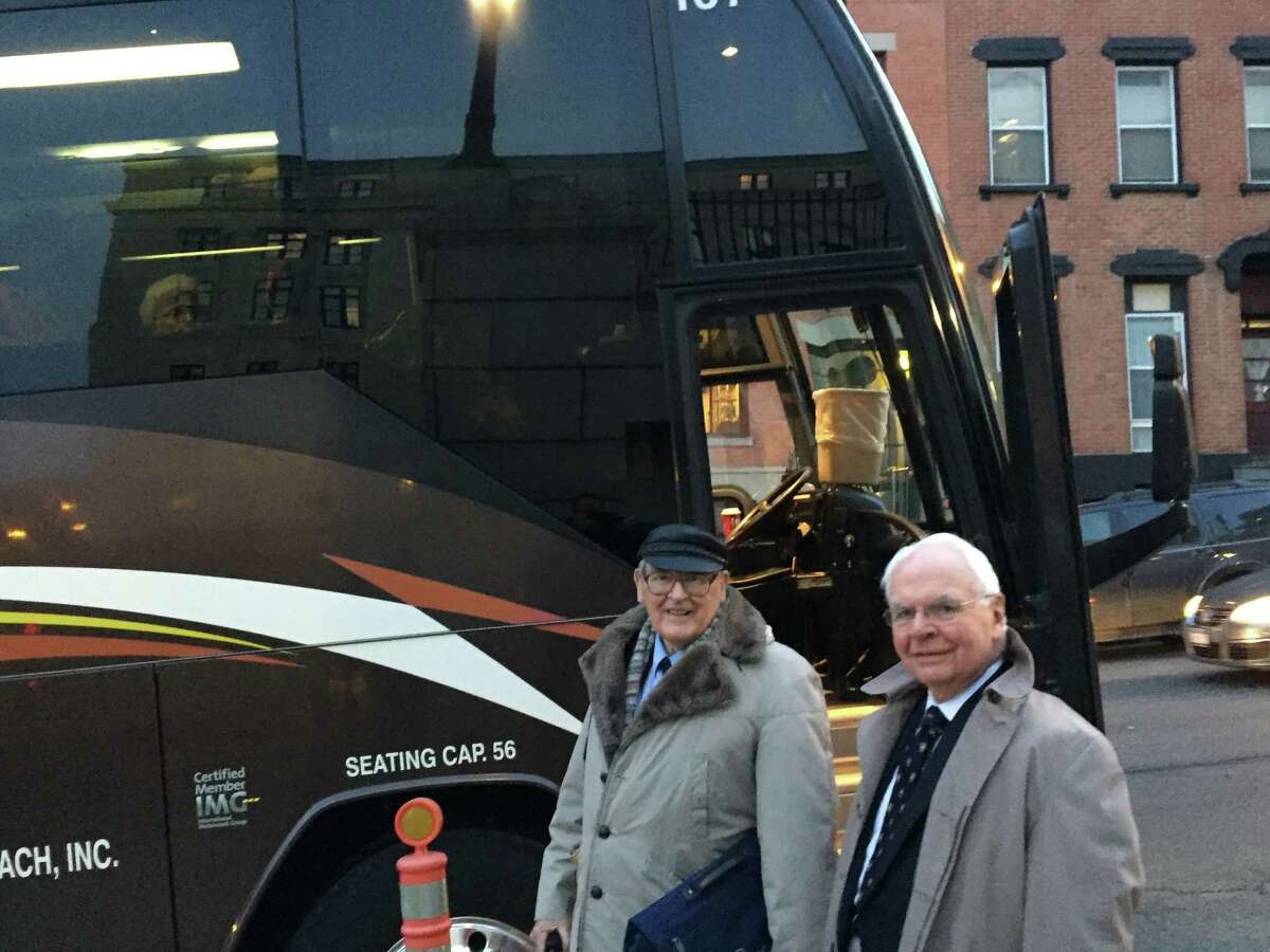 Arthur Casey, right, was among 47 senior citizens from Coburg Village in Rexford who rode a bus to Albany on Wednesday expecting to hear arguments about a lawsuit filed by state Attorney General Eric Schneiderman against the managers of their housing complex. (Robert Gavin / TImes Union)