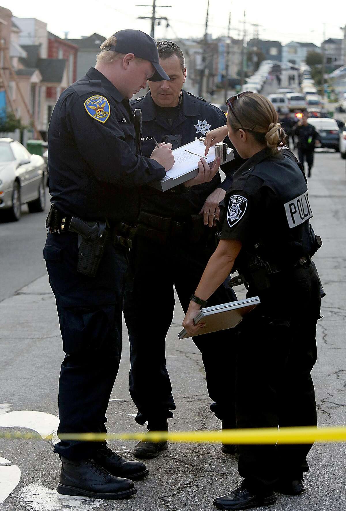 Police a block from the site of the officer involved shooting on the 200 block of Montana Street on Tuesday, Oct. 25, 2016 in San Francisco, Calif.