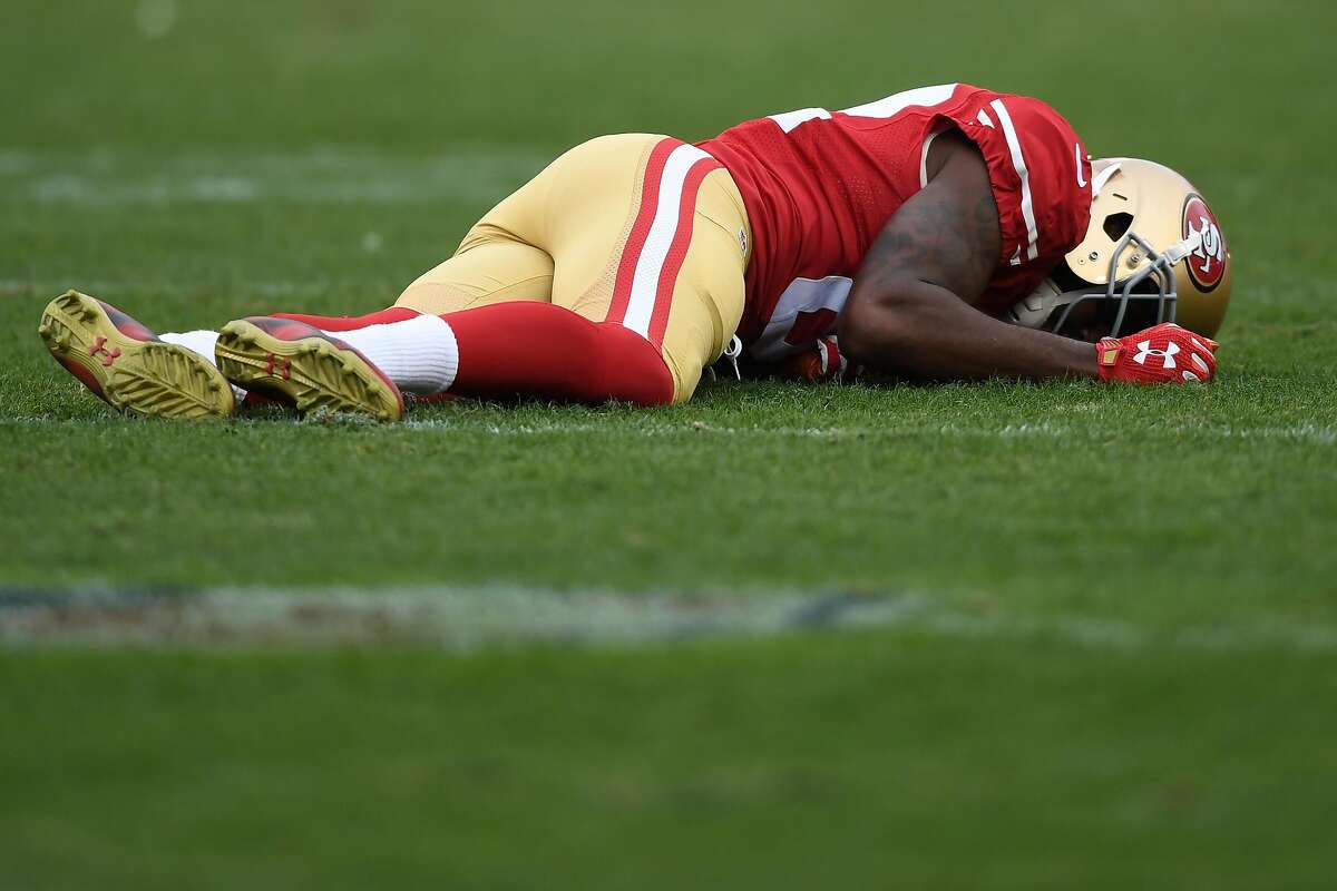 SANTA CLARA, CA - DECEMBER 11: Torrey Smith #82 of the San Francisco 49ers lays on the turf after failing to make a catch against the New York Jets during their NFL game at Levi's Stadium on December 11, 2016 in Santa Clara, California. (Photo by Thearon W. Henderson/Getty Images)