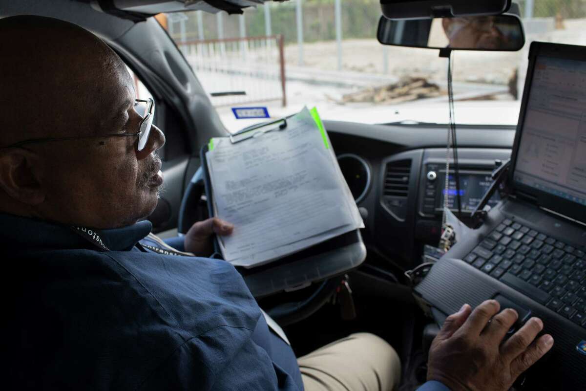 Harris County development investor Byron Adams takes a look at the profile of a new construction site he has been inspecting, Wednesday, Nov. 30, 2016. ( Marie D. De Jesus / Houston Chronicle )
