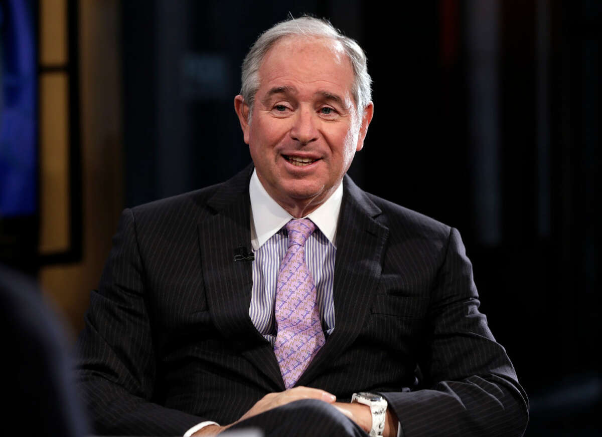 Blackstone Group CEO Stephen Schwarzman is interviewed in 2014 by Maria Bartiromo during her "Opening Bell with Maria Bartiromo" program, on the Fox Business Network, in New York. President-elect Donald Trump on Dec. 2 announced the formation of an advisory group, led by Schwarzman, of more than a dozen CEOs and business leaders who will offer input on how to create jobs and speed economic growth.