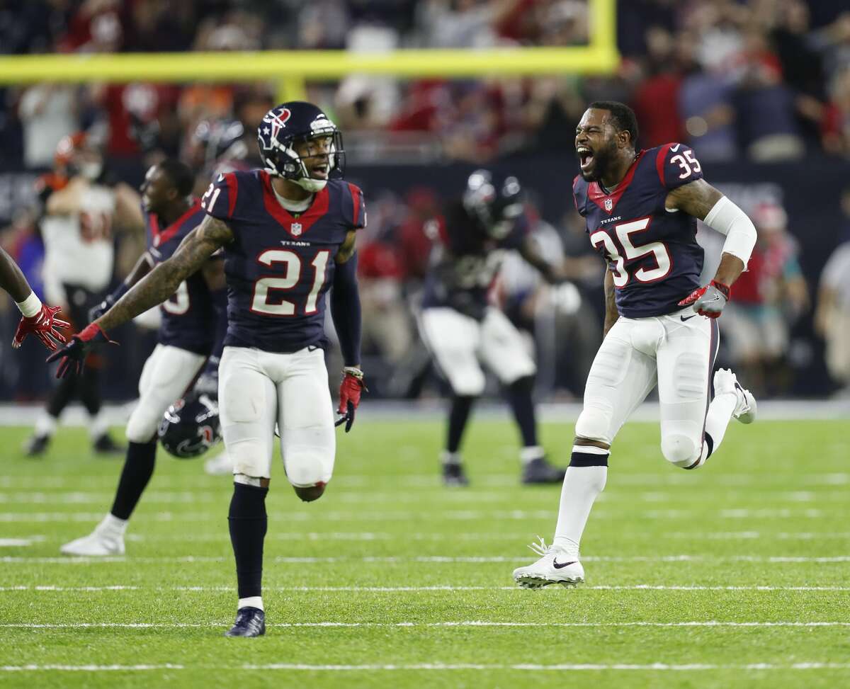 Houston Texans cornerback A.J. Bouye (21) and defensive back Eddie Pleasant (35) react after Cincinnati Bengals kicker Randy Bullock (4) misses a field goal giving the Texans the 12-10 win during the fourth quarter of an NFL football game at NRG Stadium, Saturday,Dec. 24, 2016 in Houston. ( Karen Warren / Houston Chronicle )