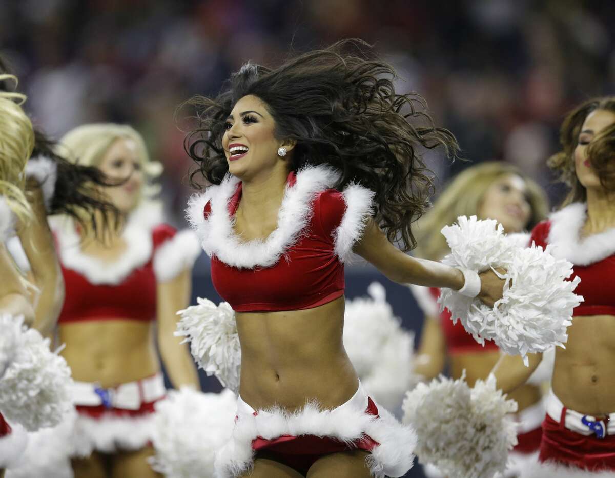 A cheerleader is seen before the first half of an NFL football