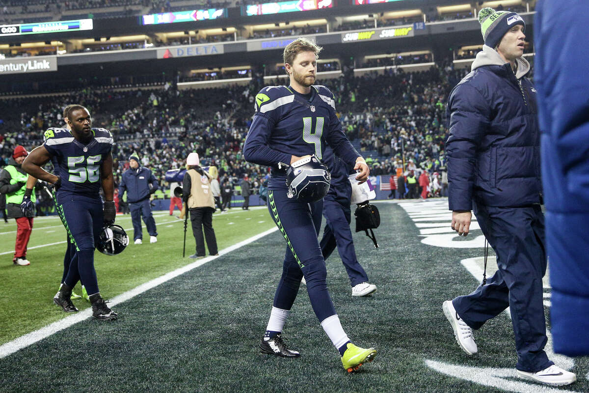 Seahawks kicker Steven Hauschka walks off field after missing an imperative extra point late in the 4th quarter against the Cardinals at CenturyLink Field on Saturday, Dec. 24, 2016. (GRANT HINDSLEY, seattlepi.com)