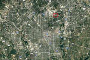 San Antonio boy sitting in back seat shot by someone in...