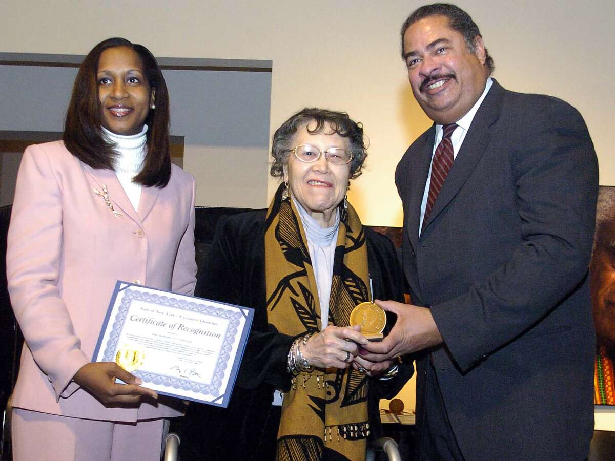 Times Union Photo by James Goolsby-Mar.10, 2005-(Center)-Margaret Cunningham, Co-founder of the Hamilton Hills Arts Center in Schenectady N.Y. and Founding Member of Black Dimensions in Art Receives her award from (Left)-Michelle Chaney Donaldson, Commissinoer, NYS Div. of Human Rights and James H.Harding, Director Legislative Affairs Office of the Govenor. During ceremonies at the NYS Museum.
