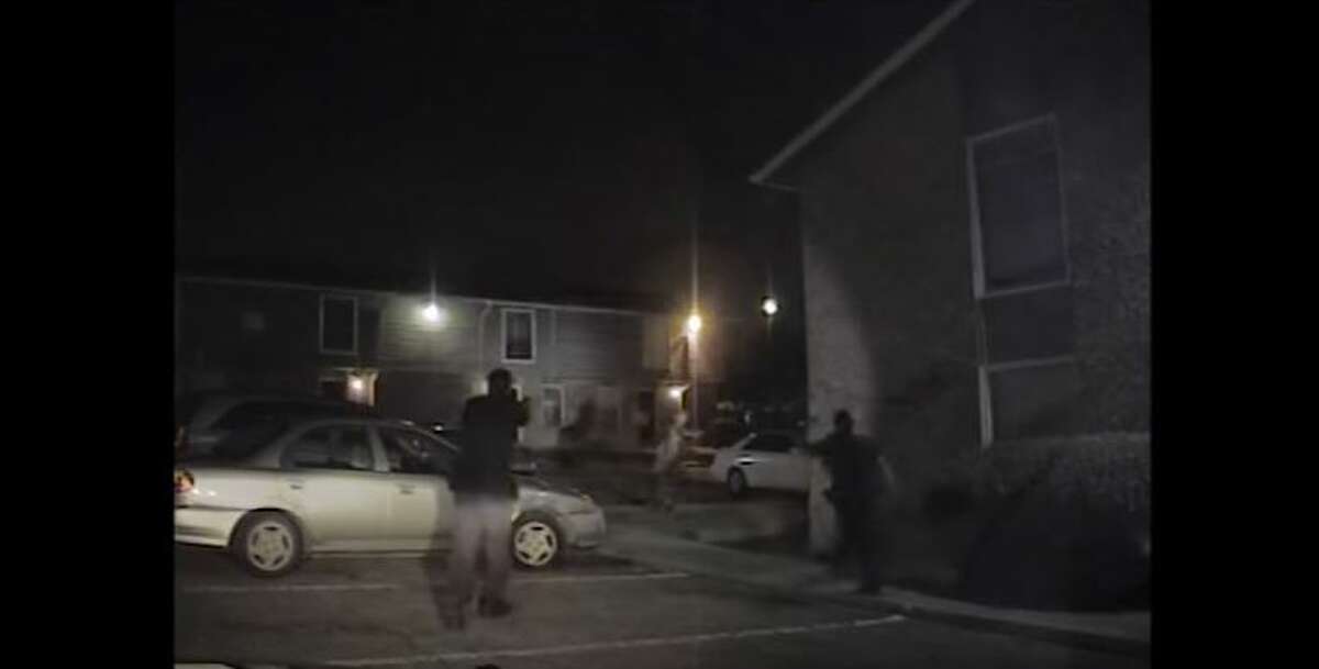 A screenshot taken from a YouTube video from The W Firm appears to show an officer firing his gun as a black man walks away. David Collie was shot in the back, and the man's lawyer says he was not a threat.