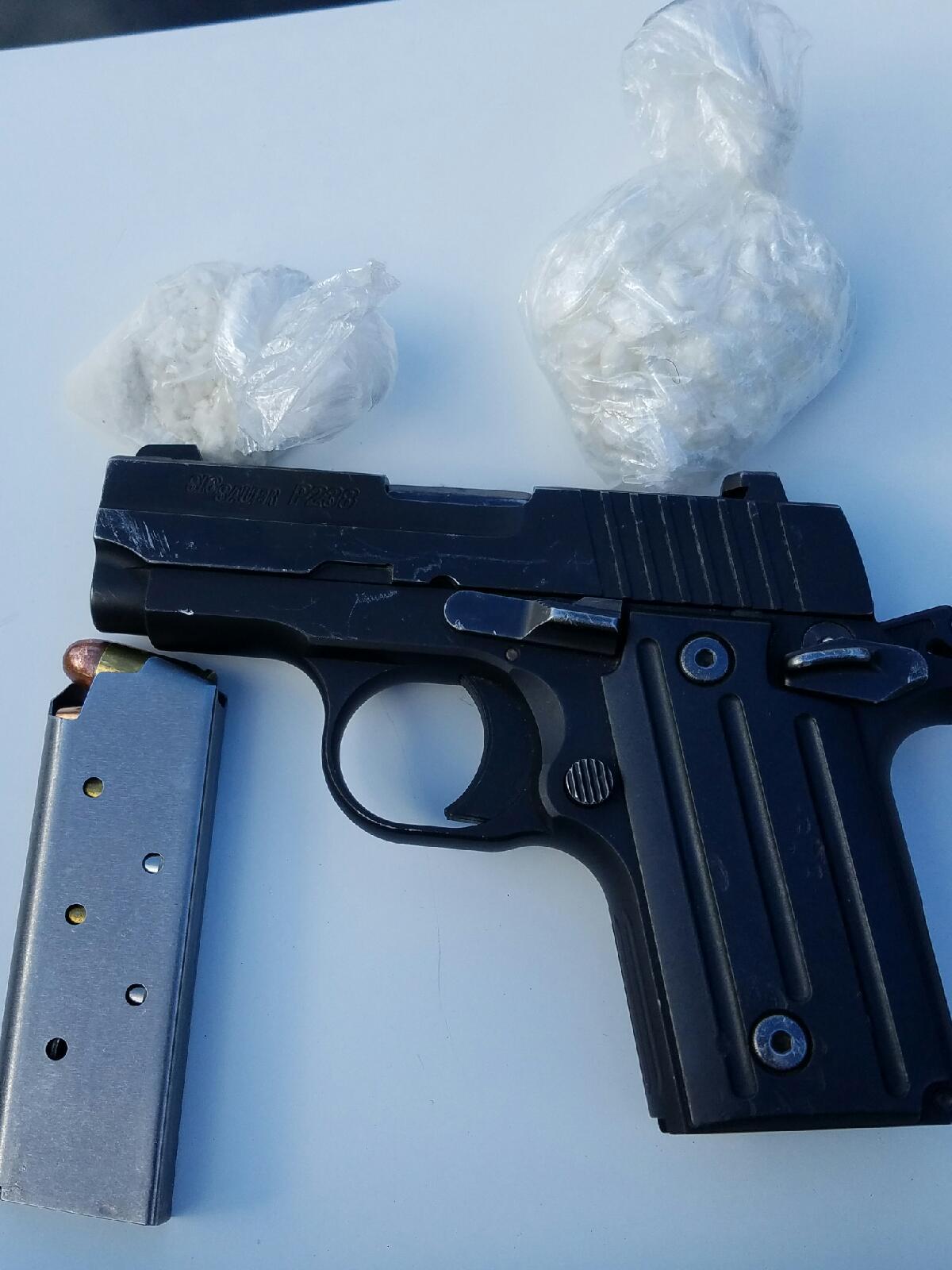 Police seize crack cocaine and stolen gun in bust