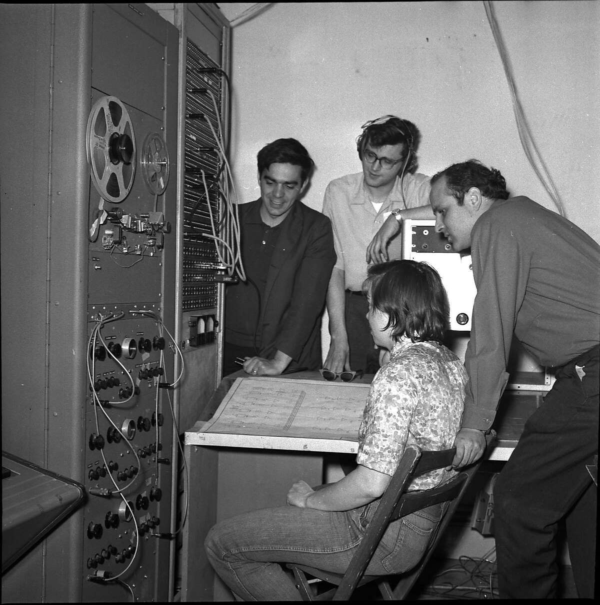 TAPEMUSIC-29MAR1964-AF - Ramon Sender, Mike Callahan, Morton Subotnick, Pauline Oliveros, at the San Francisco Tape Music Center, with all sorts of sound generators. Tape Center wants $1200 to transform itself from a local into and international institution. Photo by Art Frisch