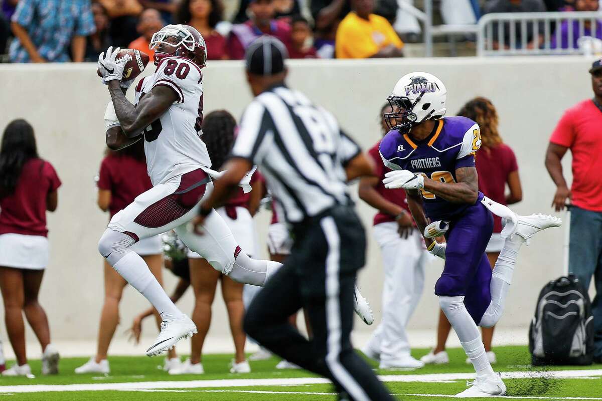 Texas Southern receiver Derrick Griffin, left, makes a touchdown catch against Prairie View on Sept. 4. Griffin was dismissed from the team later that month for breaking team rules.