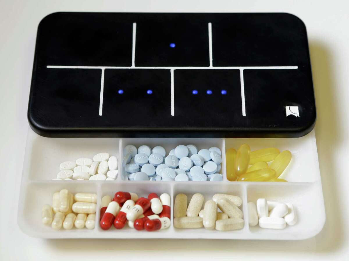 A prototype of Ellie Grid, a smart pillbox, which was designed by Regina Vatterott Abe Matamoros to make taking pills and organizing them more efficient shown Thursday, Dec. 1, 2016, in Houston. ( Melissa Phillip / Houston Chronicle )