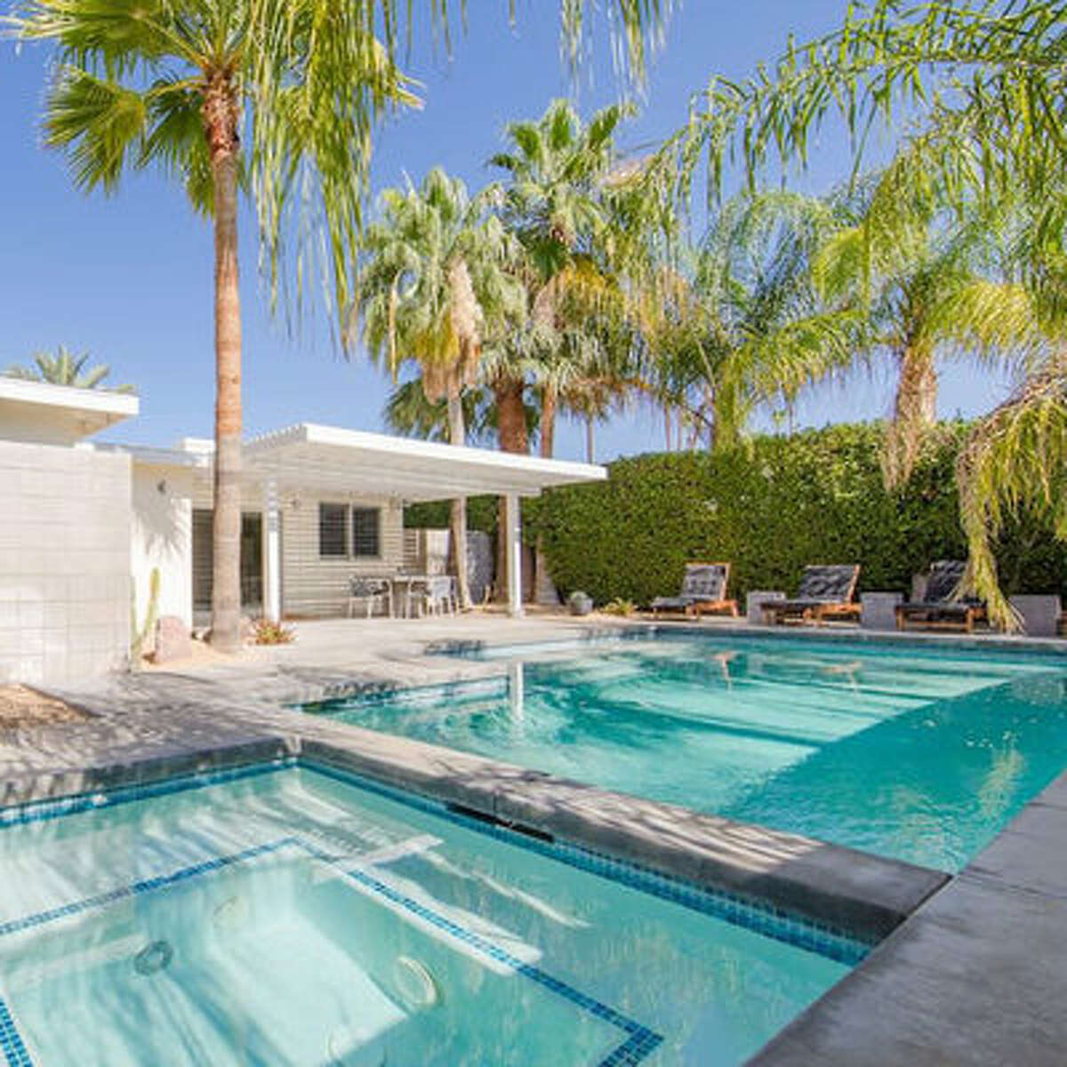 Instead of heading off to big resorts or amusement parks or national parks, we will book Airbnbs or VRBOs or other short term rentals with big yards and backyard pools like this Palm Springs beauty.