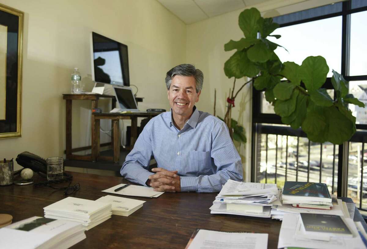 Capital Institute Founder and President John Fullerton poses in the Capital Institute office in Greenwich, Conn. Wednesday, Dec. 14, 2016. Capital Institute is a non-partisan think-tank launched in 2010 by former JPMorgan Managing Director John Fullerton that promotes free enterprise economics to contribute to global causes.