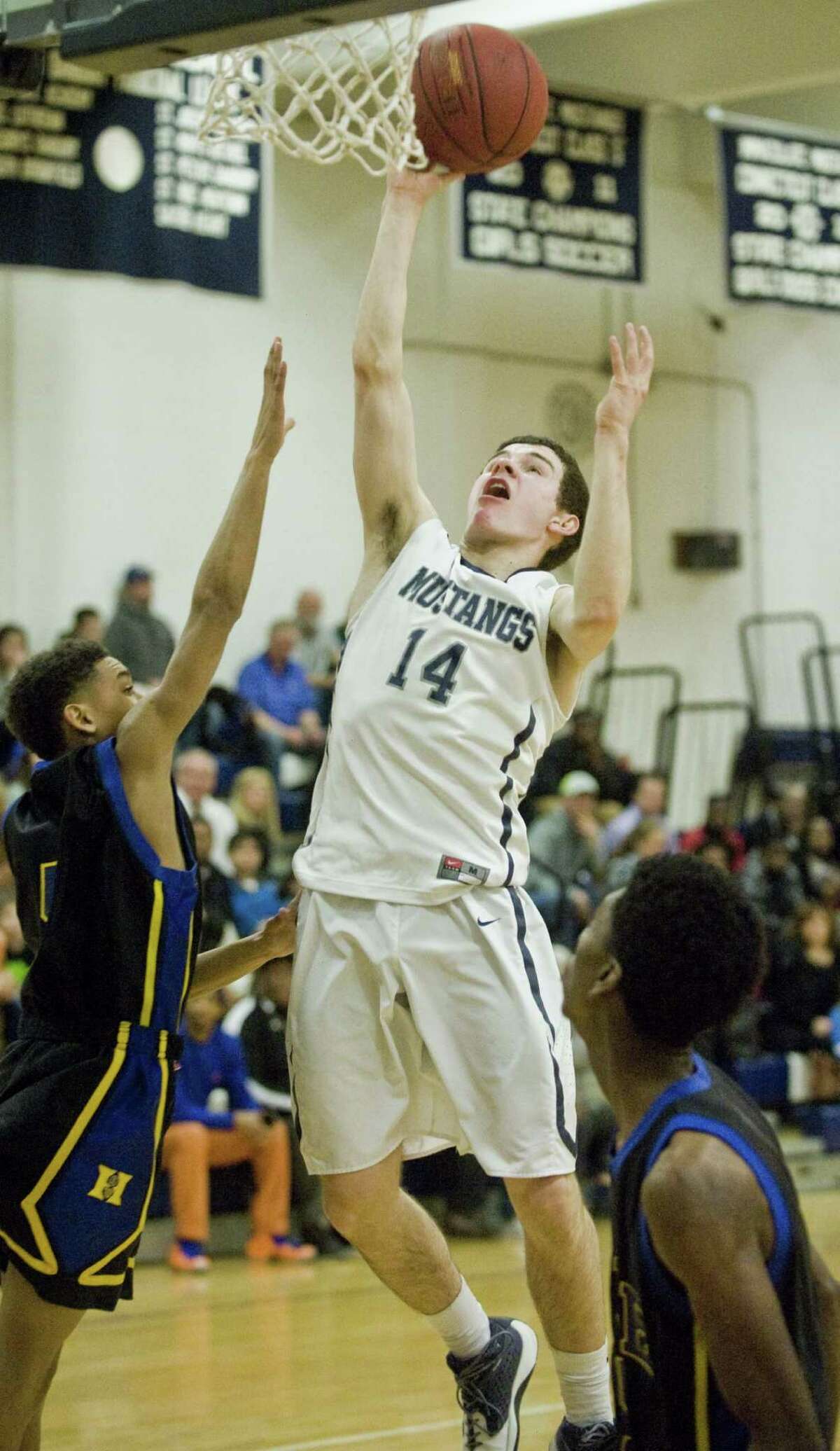 FILE PHOTO: Immaculate High School's Ronan Doherty goes up to the basket during the Class S game against Hyde Leadership School, played at Immaculate. Monday, March 7, 2016