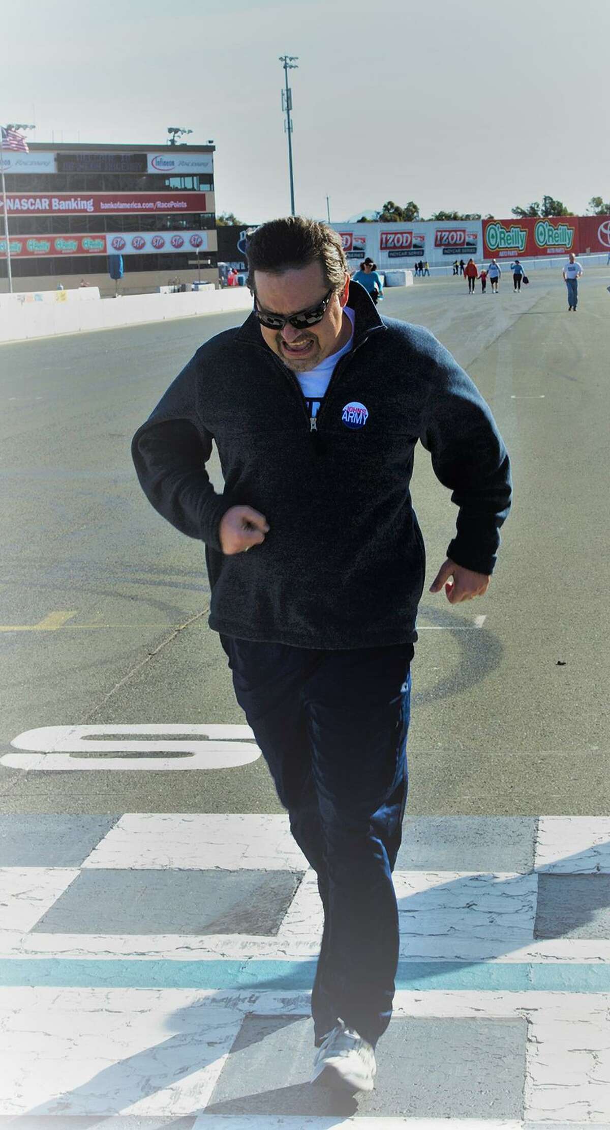 John Cardinale finishes the inaugural John’s March Against Cancer fundraiser in 2012. He ran nearly the entire 2.52-mile road course.