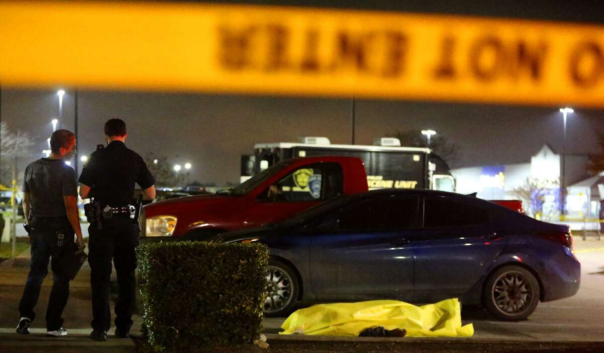 San Antonio Police investigate the death of a person found Wednesday, Dec. 28, 2016 in the parking lot of a Jack In the Box restaurant on Rigsby Avenue on the East Side. The man, later identified as Eddie Carter, was one of the last people murdered in 2016. Over 150 people were killed last year, making it the deadliest year since 1995.