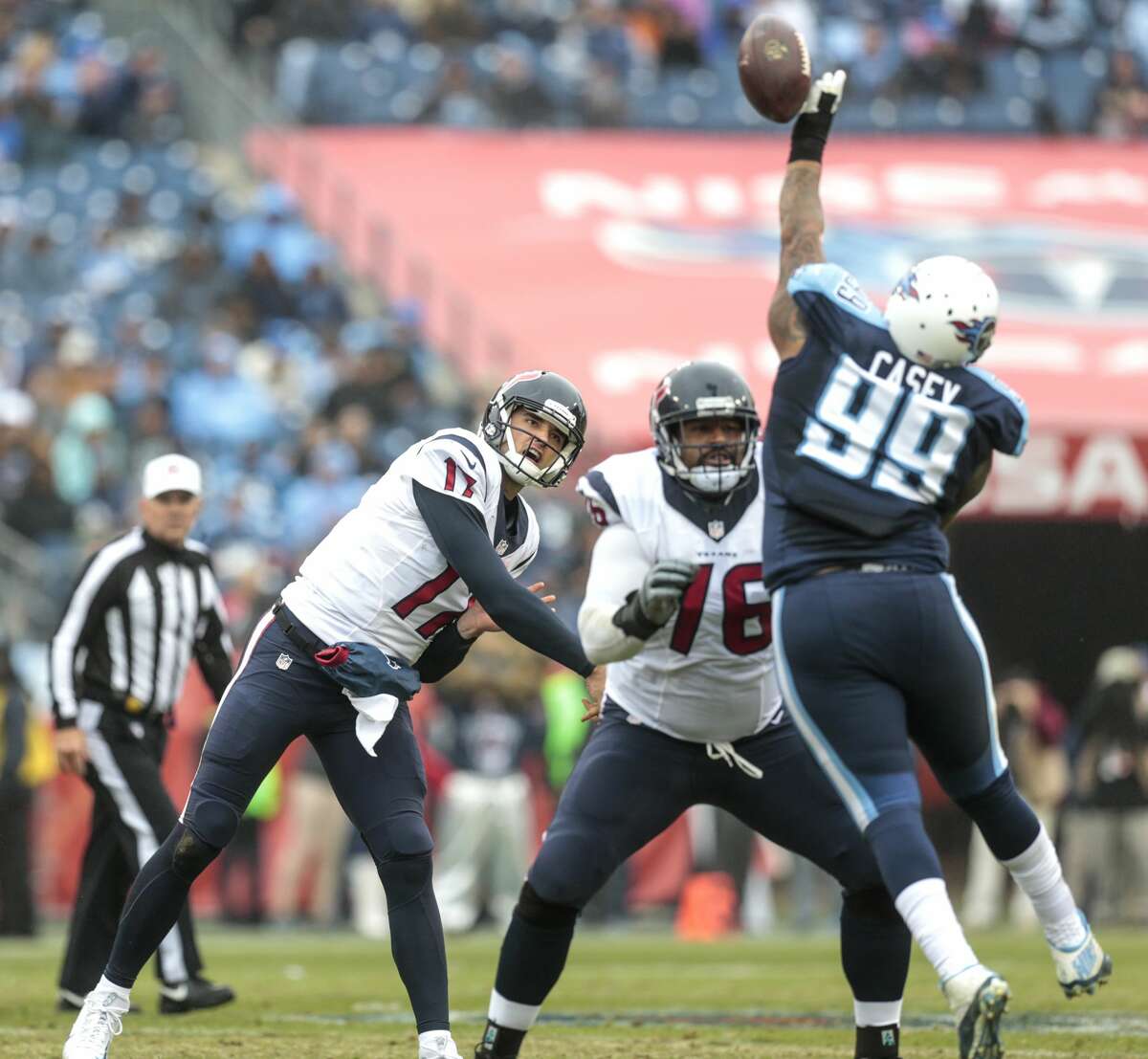Tennessee Titans defensive end Jurrell Casey (99) knocks down a pass by Houston Texans quarterback Brock Osweiler (17) during the second quarter of an NFL football game at Nissan Stadium on Sunday, Jan. 1, 2017, in Nashville. ( Brett Coomer / Houston Chronicle )