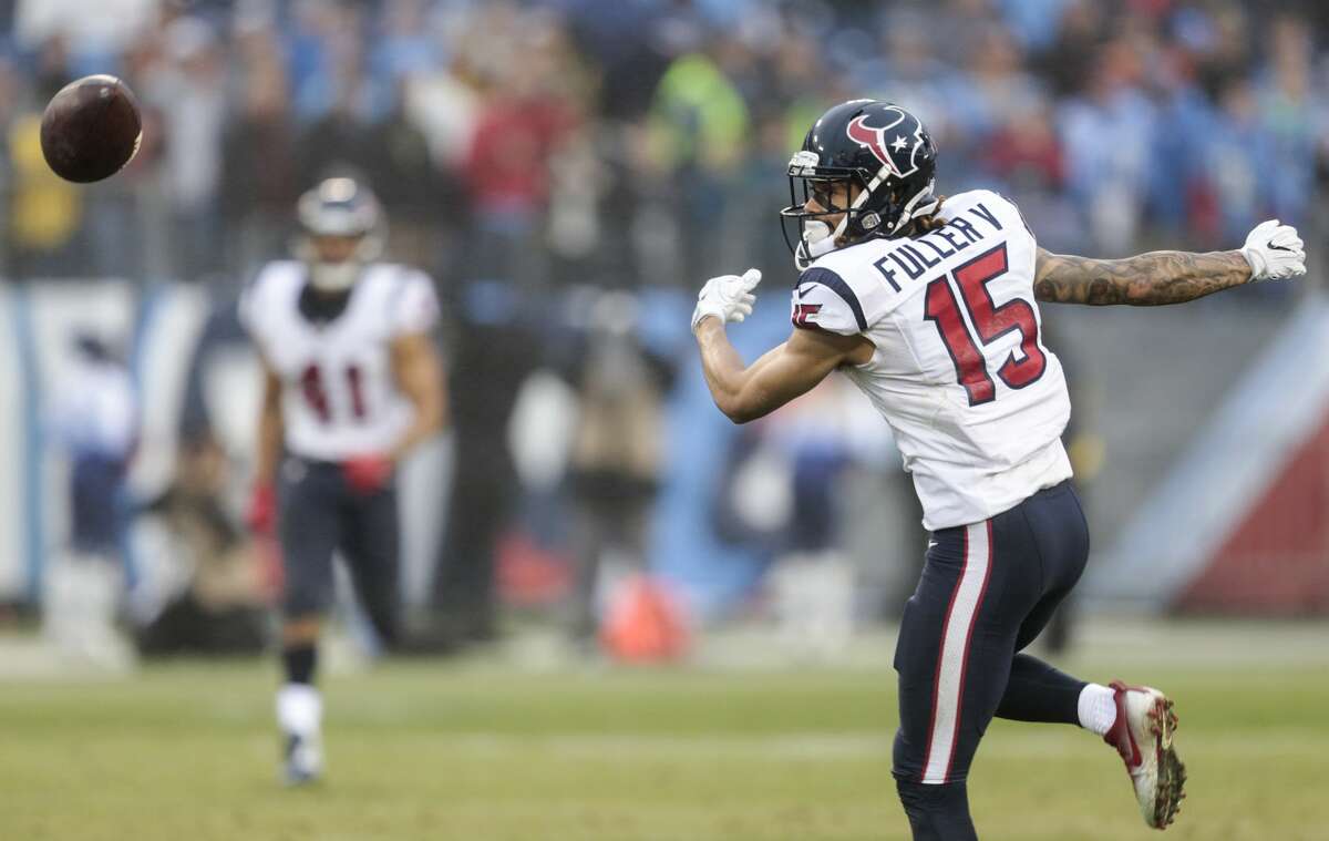 Houston Texans wide receiver Will Fuller (15) can't come down with a reception against the Tennessee Titans during the fourth quarter of an NFL football game at Nissan Stadium on Sunday, Jan. 1, 2017, in Nashville. ( Brett Coomer / Houston Chronicle )