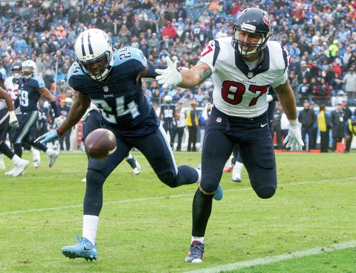 Titans safety Daimion Stafford (24) breaks up a pass intended for Texans tight end C.J. Fiedorowicz (87) at the goal line. Fiedorowicz had two receptions, one a 4-yard touchdown from Brock Osweiler.