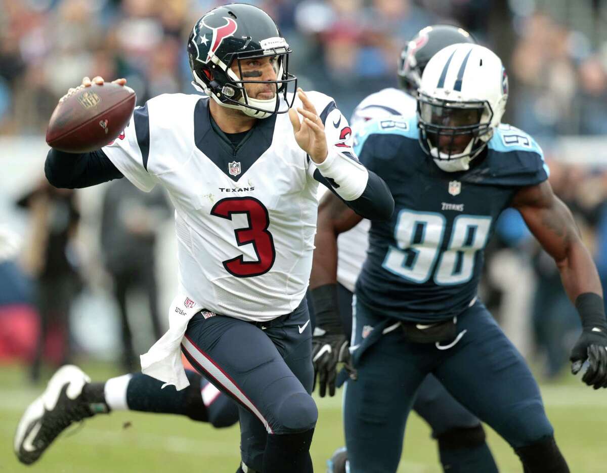 Texans quarterback Tom Savage is pressured by Tennessee Titans outside linebacker Brian Orakpo (98) during the first quarter at Nissan Stadium on Sunday.