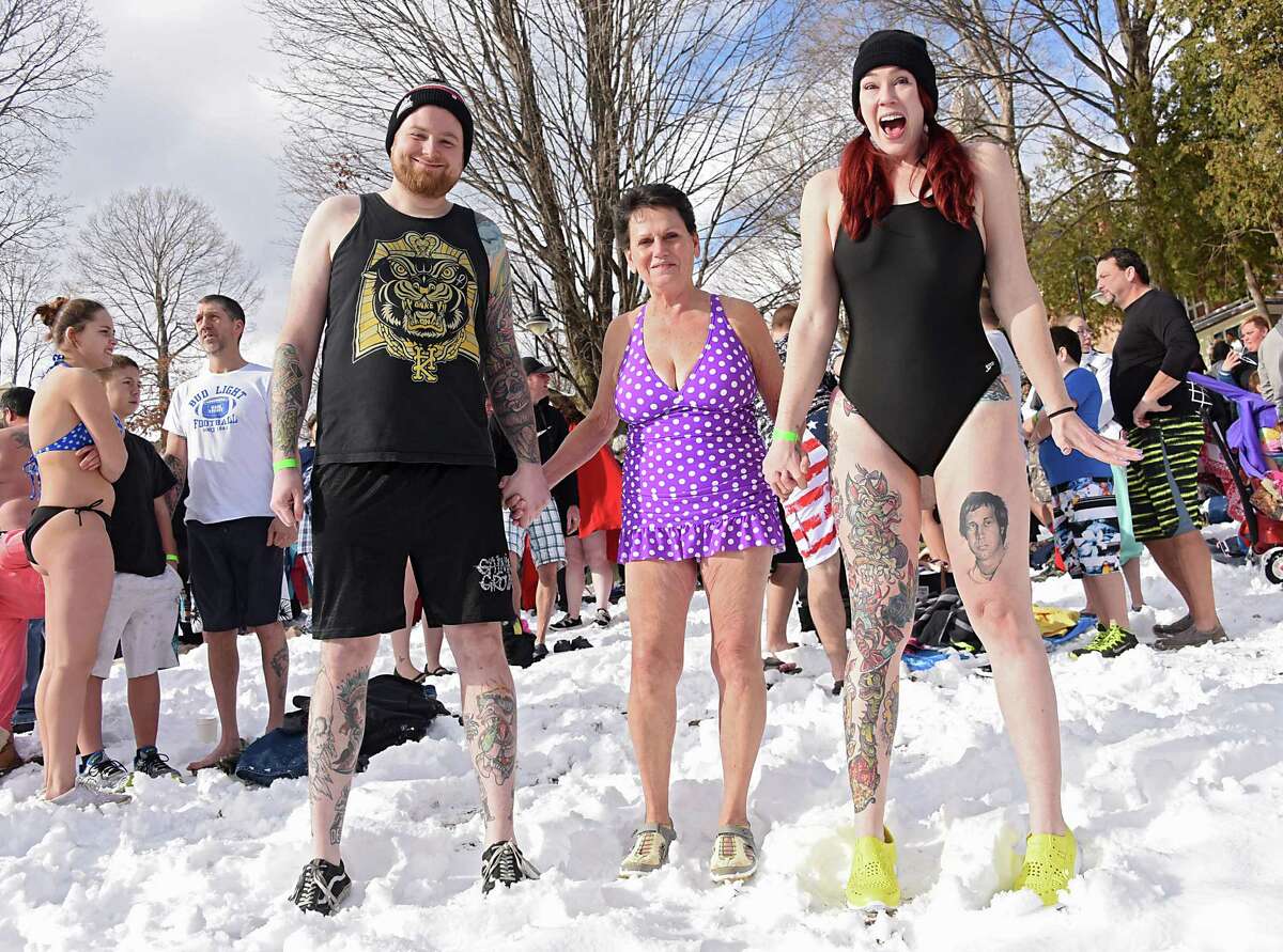 Photos Polar Plunge in Lake icy water.