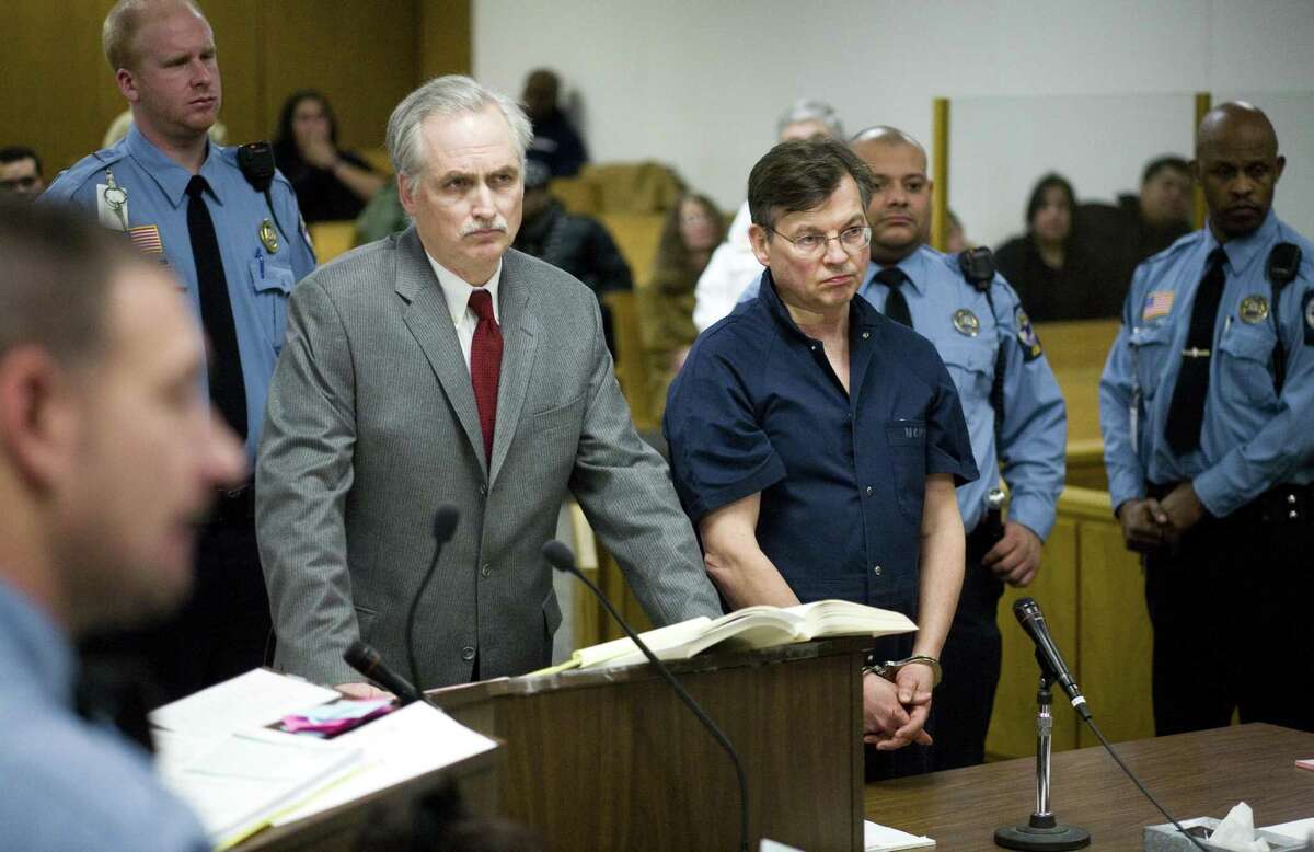 John Michael Farren of New Canaan, center right, is arraigned in state Superior Court in Norwalk Thursday after he was charged with attempted murder and strangulation following a report of a domestic dispute shortly after 10 p.m. At center left is his attorney, Eugene Riccio. Special Dru Nadler
