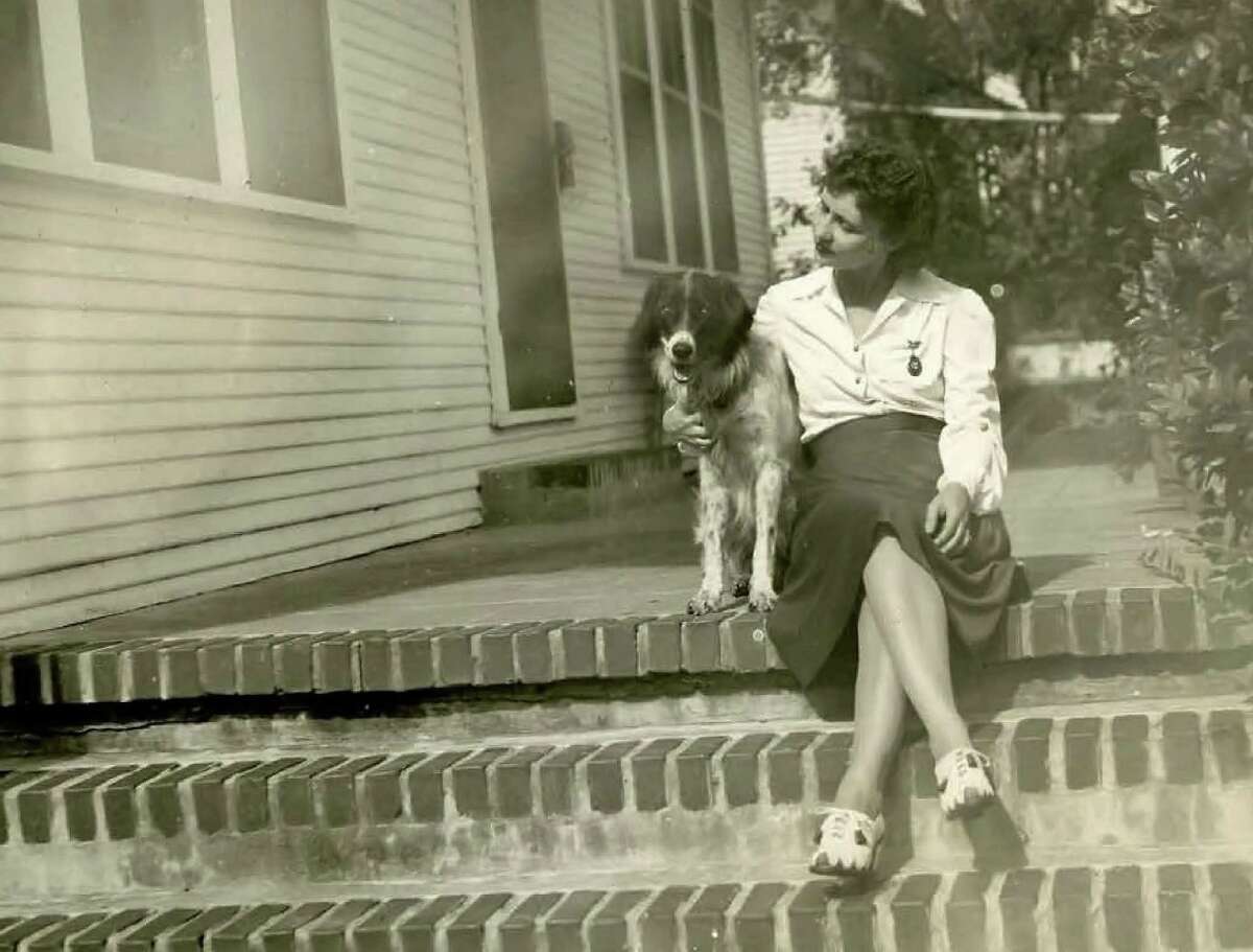 Bessie Goethel with her dog Fritzie whom she loaned to the U.S. Military as a military dog in the early 1940's.