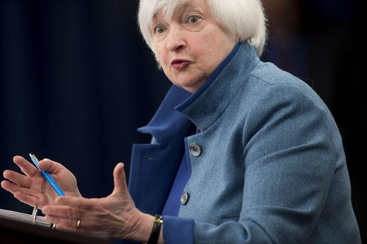 (FILES) This file photo taken on December 14, 2016 shows Federal Reserve Chair Janet Yellen during a press conference following the announcement that the Fed will raise interest rates, in Washington, DC. The US job market is at its strongest since the start of the financial crisis and there are signs workers will start to see the benefits in their paychecks, Federal Reserve Chair Janet Yellen said on December 19, 2016. In the first speech by a Fed official since the central bank raised interest rates last week for only the second time in a decade, Yellen was moderately optimistic about job prospects, even though the economy is growing slowly. / AFP PHOTO / SAUL LOEBSAUL LOEB/AFP/Getty Images