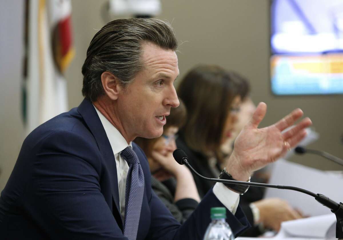 Lt. Gov. Gavin Newsom discusses the State Lands Commission's decision to to begin exploring whether to use eminent domain to seize property in a dispute over public access to Martin's Beach, during a commission meeting in Sacramento, Calif., Tuesday, Dec. 6, 2016. The decision was made after negotiations with the property owner, Vinod Khosla, the co-founder of Sun Microsystems Inc., failed to produce a solution. (AP Photo/Rich Pedroncelli)
