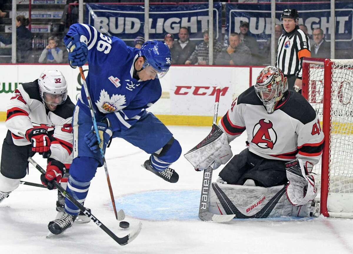 Devils defenseman Brandon Gormley defends against Marlies Kerby Rychel in the crease during their hockey game at the Times Union Center on Tuesday Nov. 22, 2016 in Albany, N.Y. (Michael P. Farrell/Times Union) ORG XMIT: MER2016112220341066