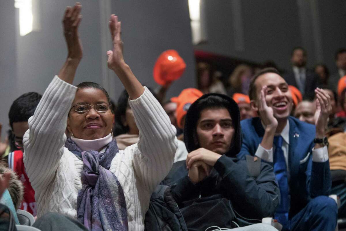 Students and faculty at LaGuardia Community College applaud Cuomo's proposal Tuesday. ﻿