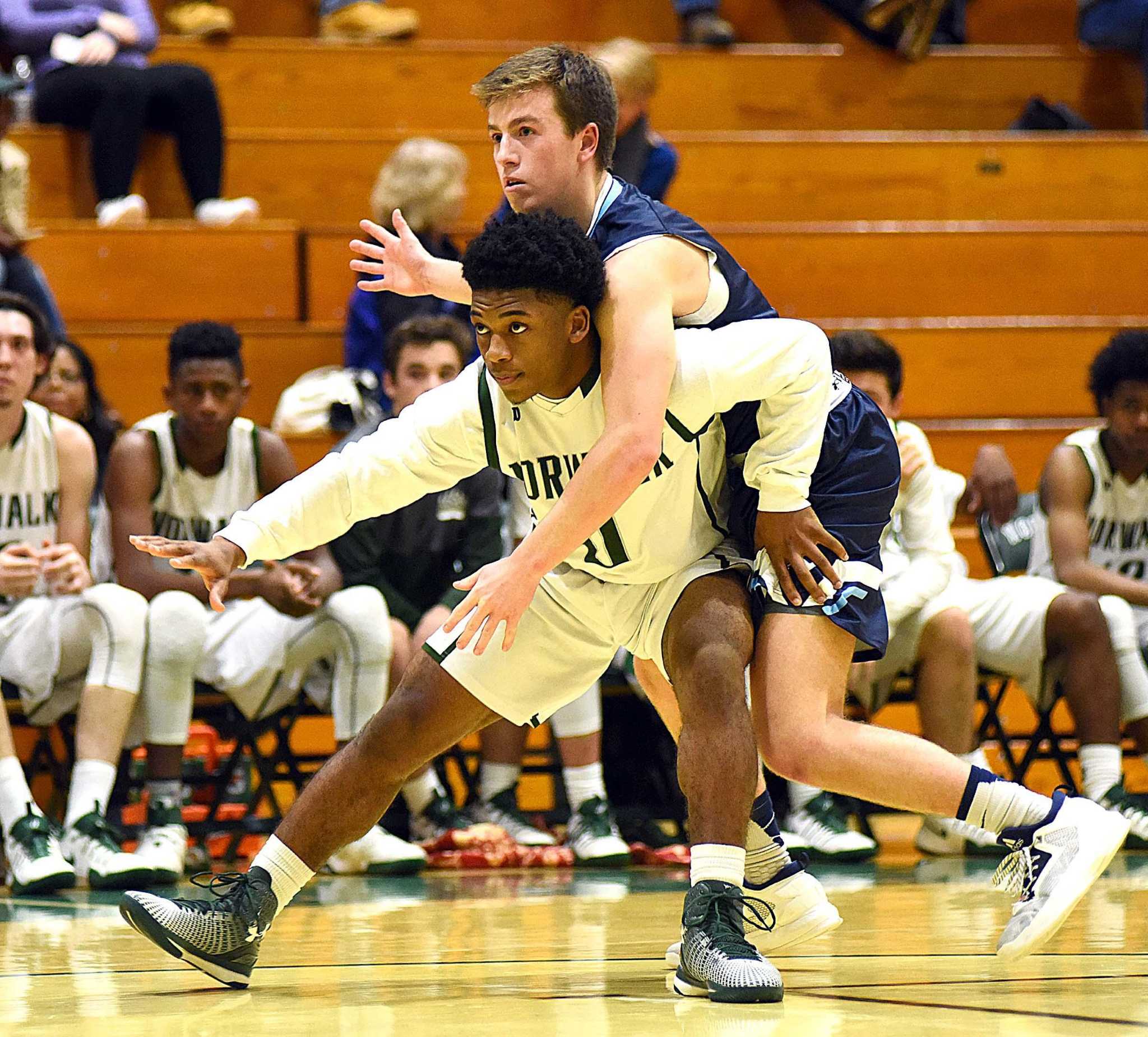 Wilton boys basketball rolls past Norwalk