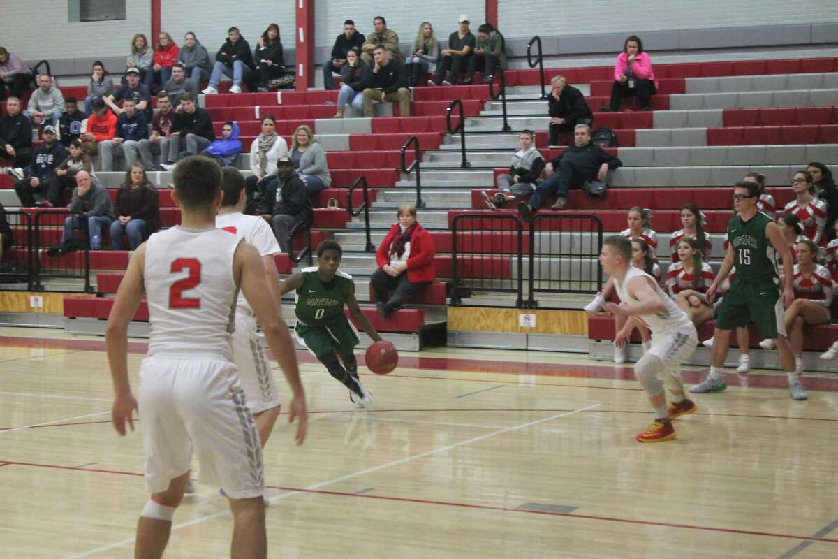 New Milford basketball gets on track against Wolcott