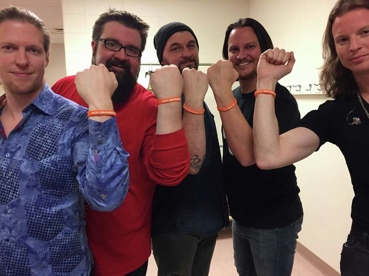 Mahlon Hardt, of Nederland, died Tuesday after a year-long battle with Acute Myeloid Leukemia. Hardt gained a lot of local support during his battle. Above is local artist, Tim Foust, with his a capella group 'Home Free' wearing 'Team Mahlon' bracelets.