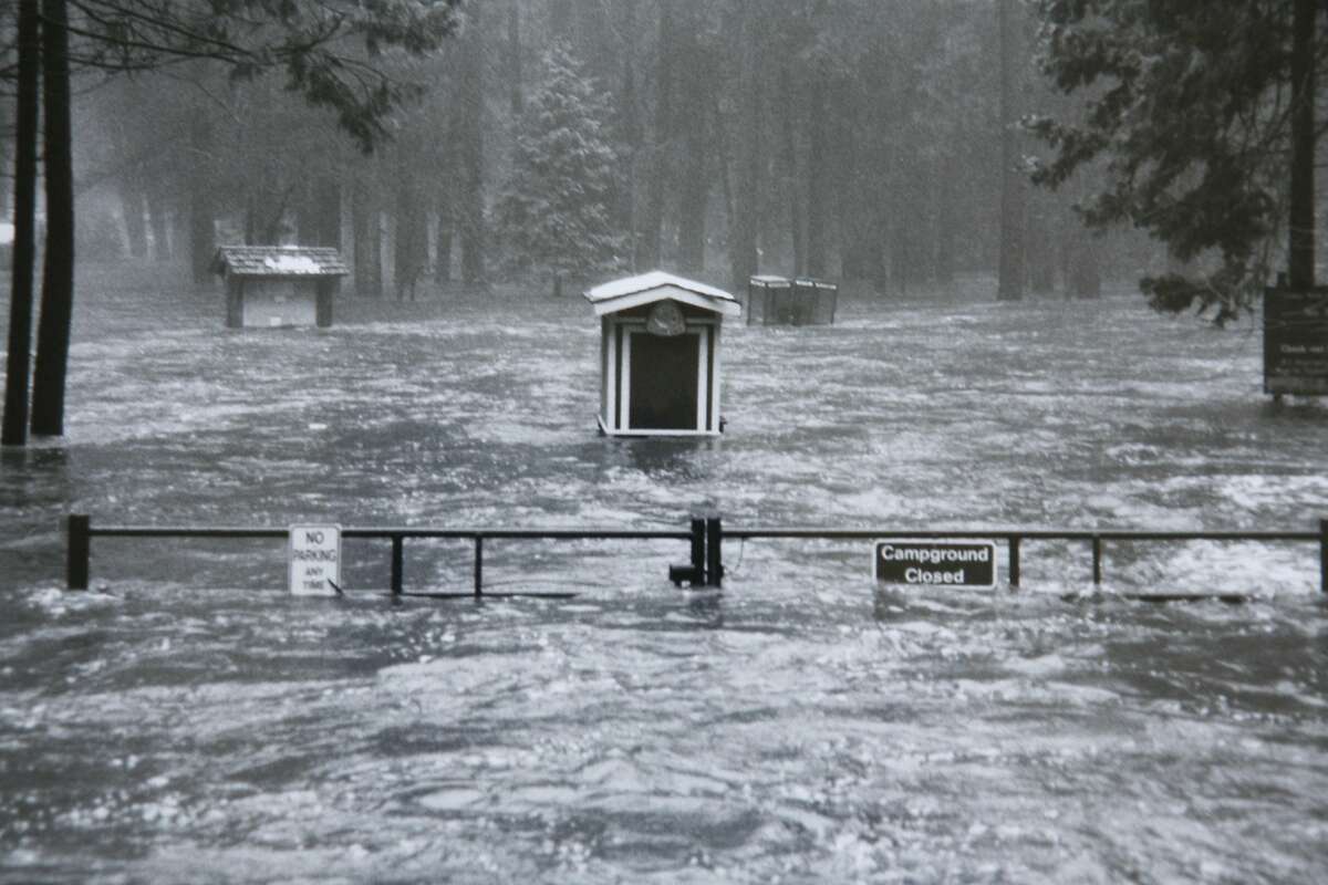 A National Park Service file photo showing the entrance to Lower River Campgrounds on January 2, 1997. Twenty years ago on January 1-3, 1997, heavy rain and warm temperatures on top of a heavy snowpack on the peaks surrounding Yosemite Valley caused the greatest flood ever seen in Yosemite since gauging stations were first installed on the Merced River over 80 years ago. The valley lost approximately half of its campsites (about 350), 200 concession employee housing units, over 50% of accommodations at the Yosemite Lodge, and 33 backcountry bridges. The valley was closed for two and a half months for repairs that are still going on today. Photo courtesy of the National Park Service.