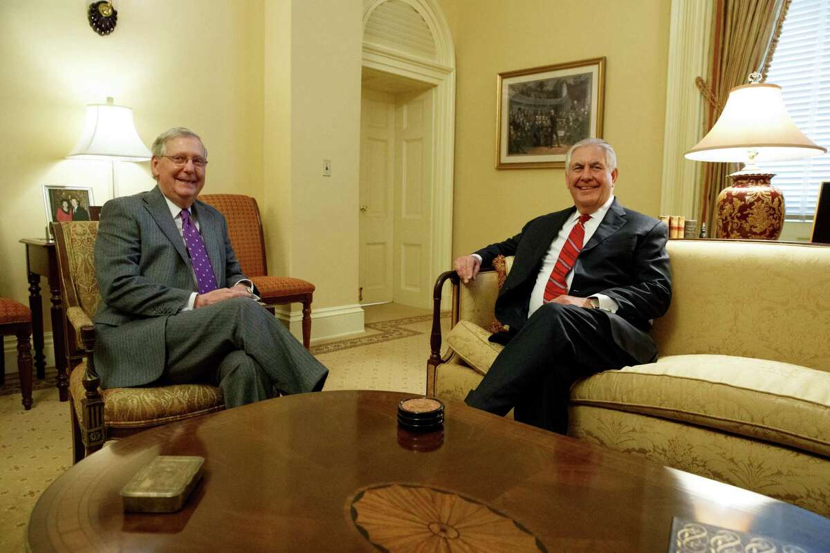 Senate Majority Leader Mitch McConnell, R-Ky., left, meets with Secretary of State-designate Rex Tillerson on Capitol Hill in Washington, Wednesday, Jan. 4, 2017. (AP Photo/Evan Vucci)
