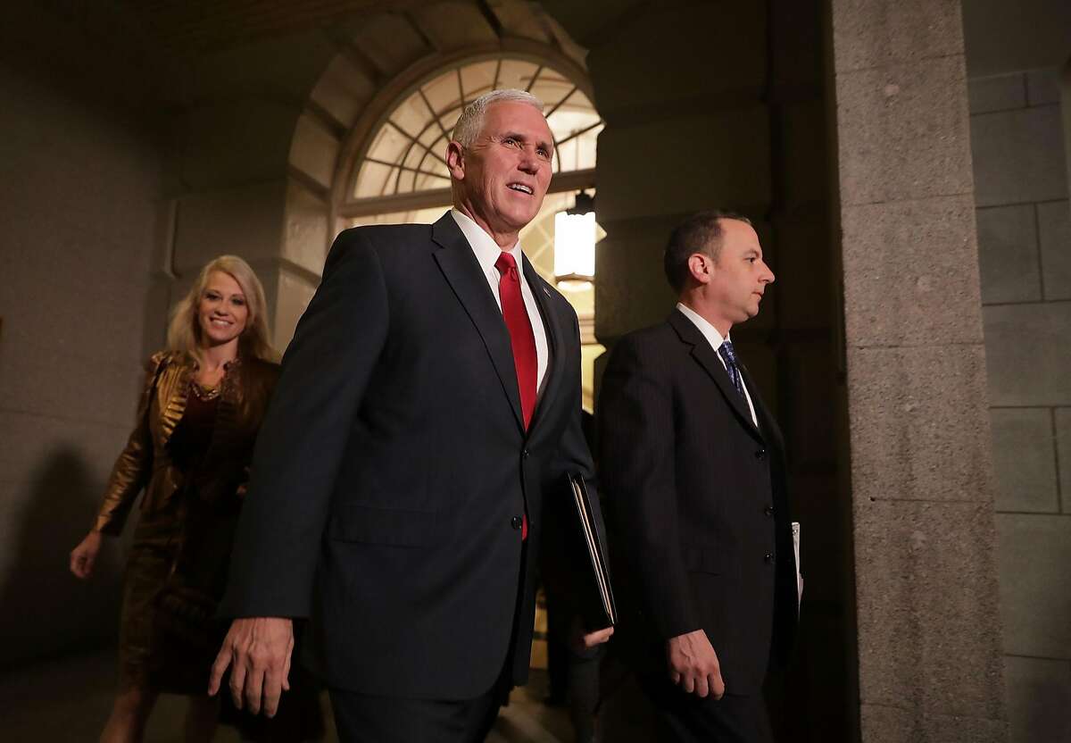 WASHINGTON, DC - JANUARY 04: U.S. Vice President-elect Mike Pence (C) is accompanied by Counselor to the President-elect Donald Trump Kellyanne Conway (L) and Trump Chief of Staff Reince Priebus (R) as they head to a meeting with House Republicans at the U.S. Capitol January 4, 2017 in Washington, DC. Pence met with GOP members to talk about a plan for repealing and replacing Obamacare. (Photo by Chip Somodevilla/Getty Images)