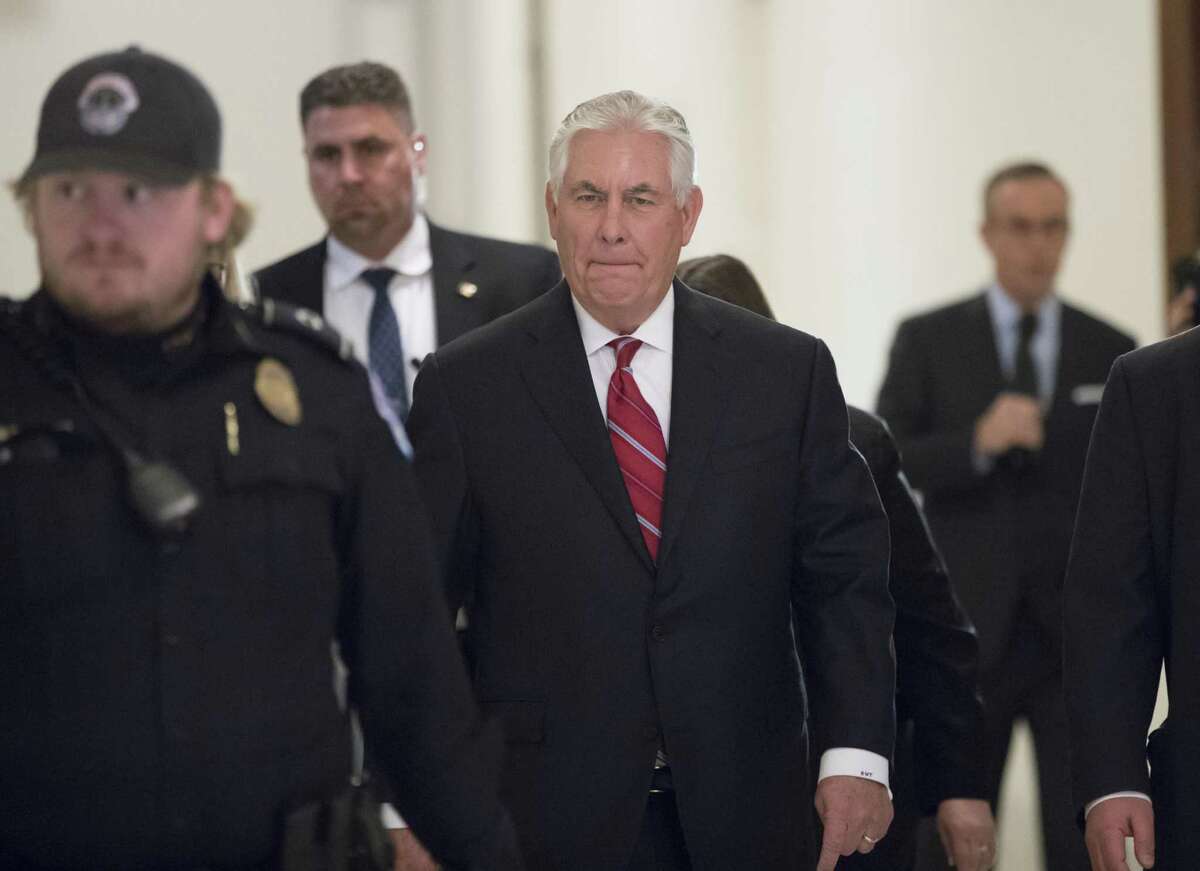 Secretary of State-designate Rex Tillerson arrives for a Wednesday meeting with Senate Foreign Relations Committee member Sen. Chris Coons, D-Del., the committee that will conduct Tillerson's confirmation hearing.