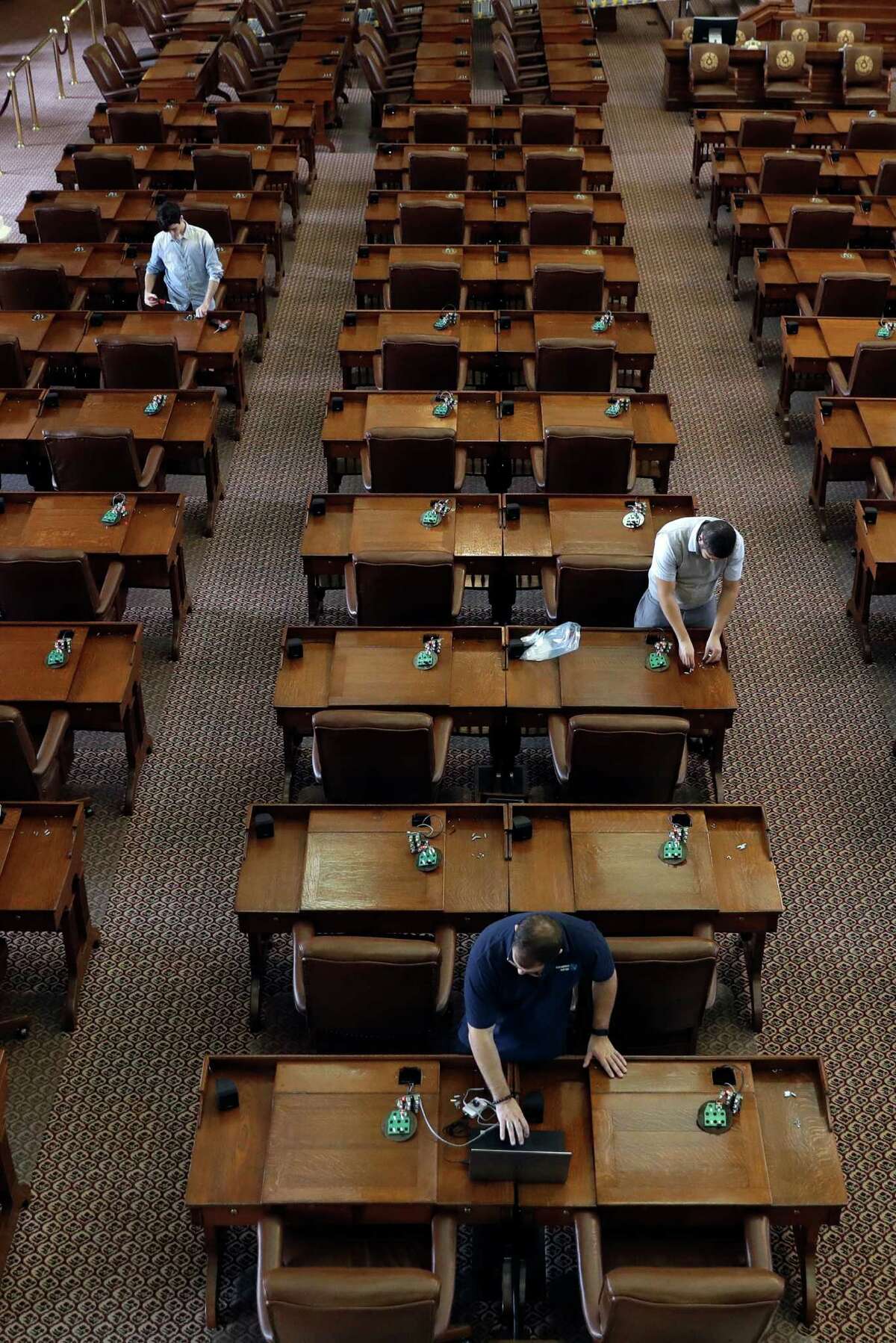 Rows of legislators' desks in the Texas House after the Texas Legislature adjourned on Monday.