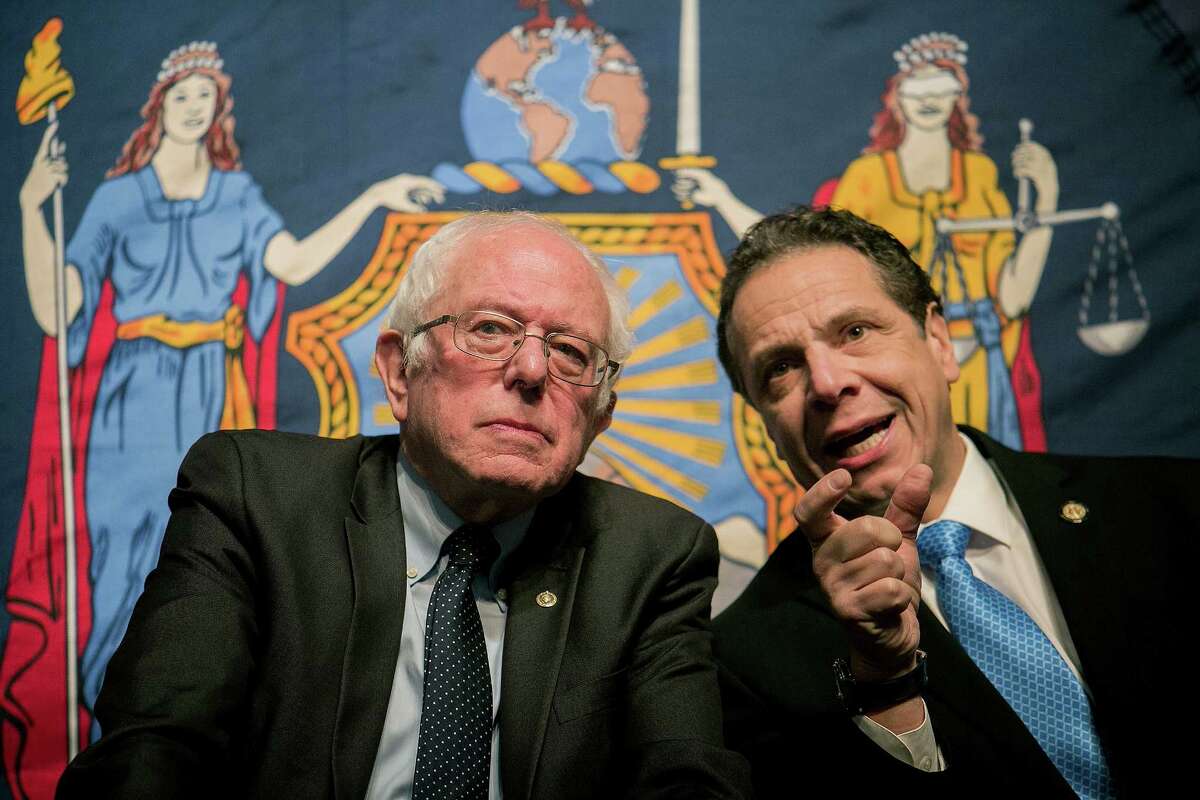 Sen. Bernie Sanders (I-Vt.) and New York Gov. Andrew Cuomo at LaGuardia Community College, where Cuomo unveiled a plan to provide free college tuition, in New York, Jan. 3, 2017. Under the plan, any college student who has been accepted to a state or city university in New York N including two-year community colleges N will be eligible provided they or their family earn $125,000 or less annually.