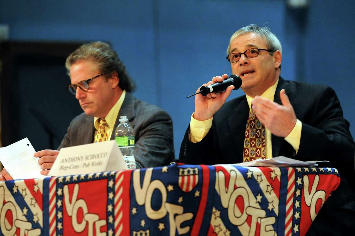 Commissioner of Public Works Anthony Scirocco right, speaks during a 2009 debate. His challenger Edward Miller now works for Scirocco and supports his campaigns as chair of the Saratoga County Independence Party. (Cindy Schultz / Times Union)