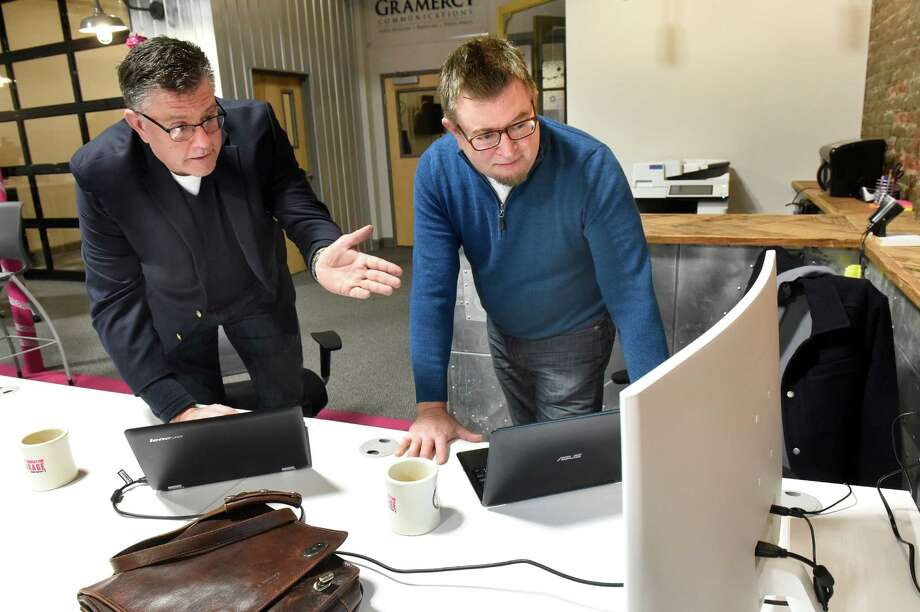 John Norris, left, and John Karling, co-owners of 5X5 Lab, talk about drmedpot.com, the website they created to locate medical marijuana doctors in New York, on Tuesday, Dec. 27, 2016, at the Troy Innovation Garage in Troy, N.Y. (Cindy Schultz / Times Union) Photo: Cindy Schultz / Albany Times Union